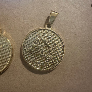 2 Libra charms (gold)