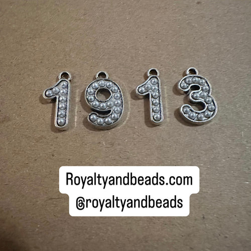 1913 number charm set.