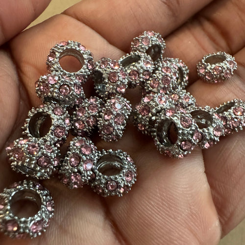 10 pink big hole beads.