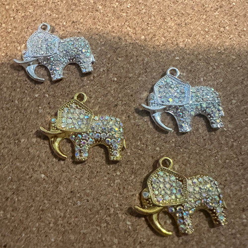 AB Clear elephant charms.