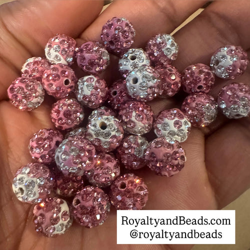 20 light pink mixed pave beads.