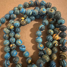 Load image into Gallery viewer, Blue swirl beads.