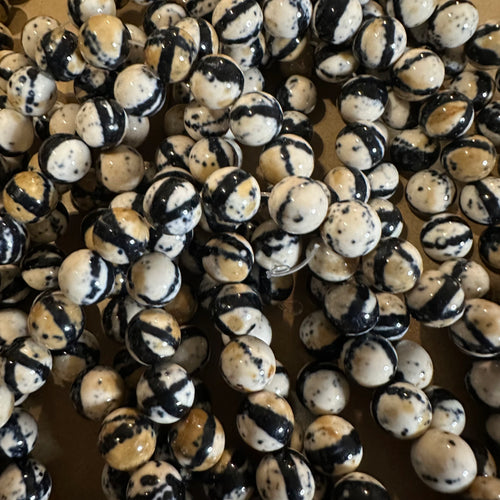 Tan and black beads.