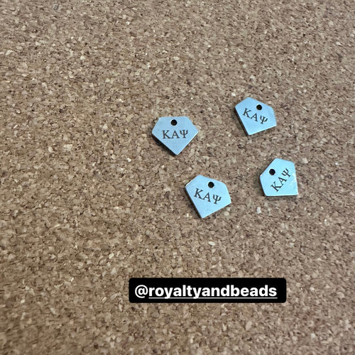 Kappa diamond charms.