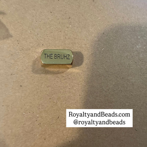 Gold Bruhz charm.