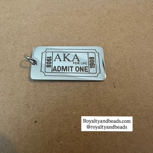 Silver AKA ticket charm.