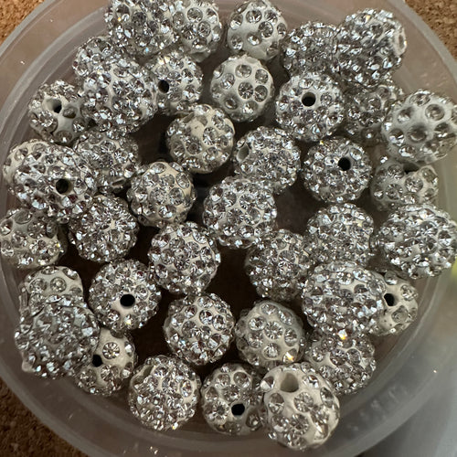 20 white mixed pave beads.