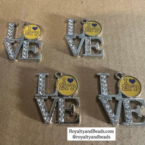 She loves Sigma Gamma Rho charm.