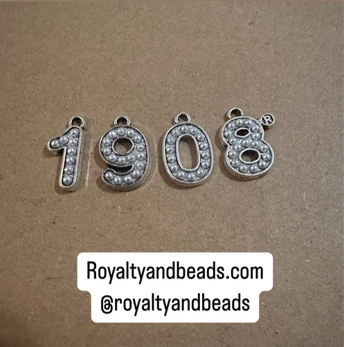 1908 number charm set.