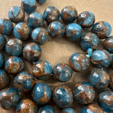 Load image into Gallery viewer, Light blue and gold beads.