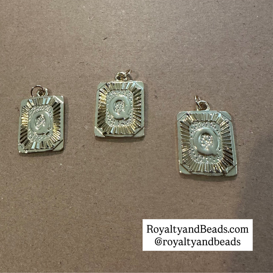 Gold Letter Q charm.