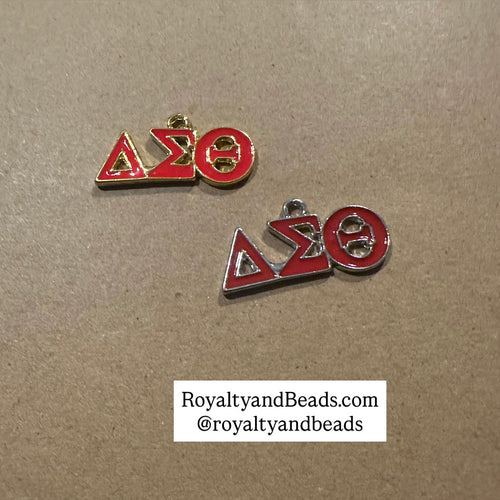 Red Delta dangle charm.