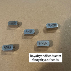 Finer block charm.