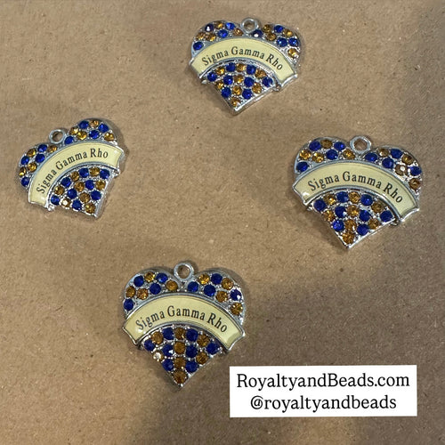 Sigma Gamma Rho heart charm.