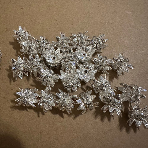 25 ailver spacers