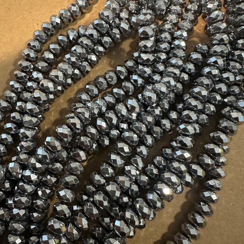 Silver spacer hematite beads.