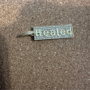 Gold pave healed charm