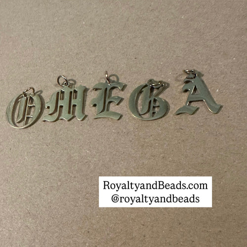 Omega letters charms.