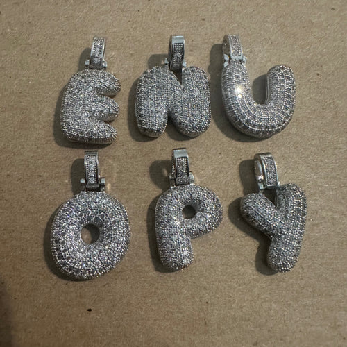 Silver pave letter charm.