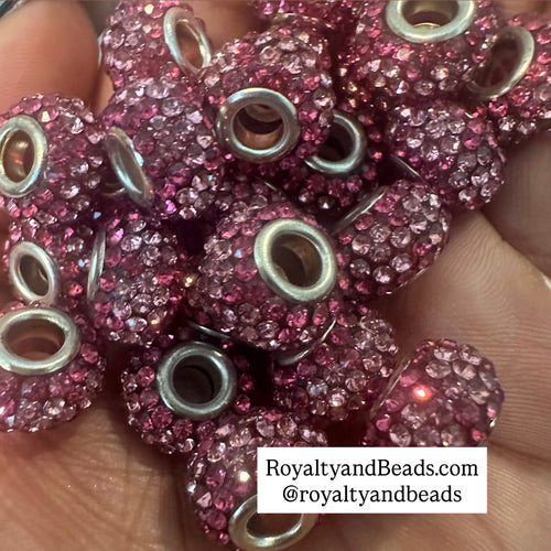 5 pink big hole beads.