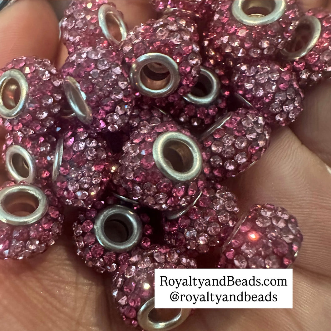 5 pink big hole beads.