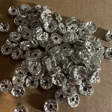 Load image into Gallery viewer, 50 silver rondelle spacers.