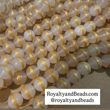 Load image into Gallery viewer, Clear and gold stripe beads