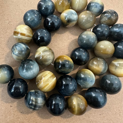 Black and gold tigers eye beads. (12mm)