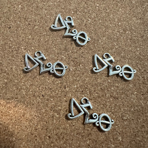 Silver Delta charm.