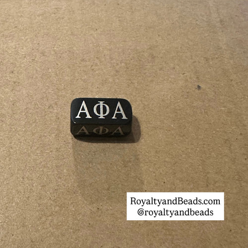 Black Alpha charms