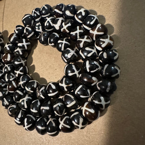 Brown and white design beads