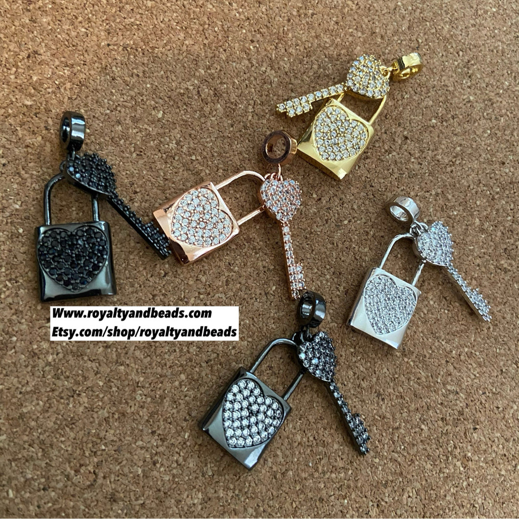 Pave lock and key charm.