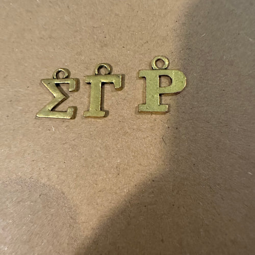 3 Sigma Gamma Rho letters