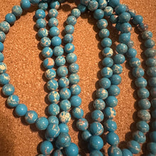 Load image into Gallery viewer, Blue and tan beads 8mm.