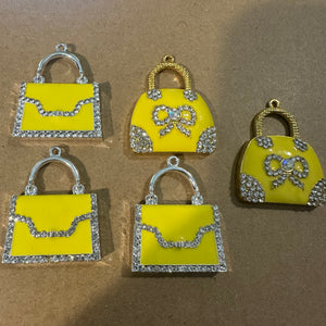 5 yellow purse charms