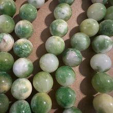 Load image into Gallery viewer, Green and white beads 12mm