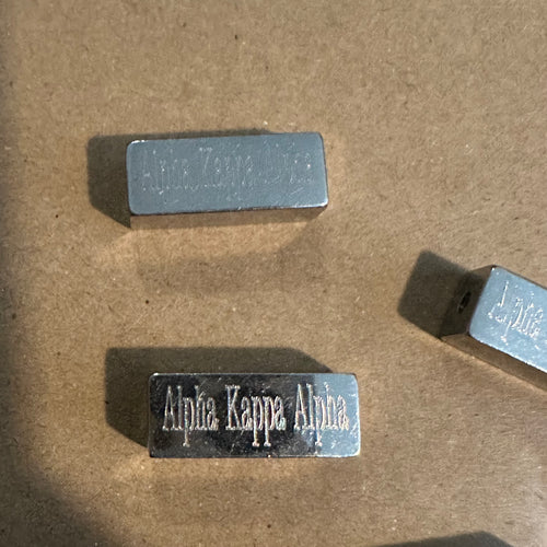 Silver Alpha Kappa Alpha bar