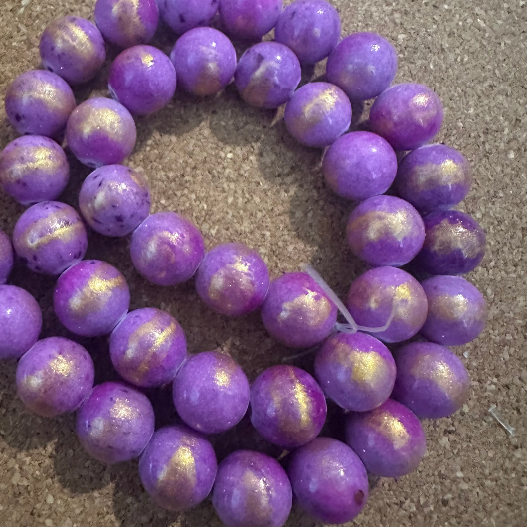 Purple and gold beads