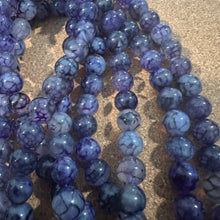 Load image into Gallery viewer, Purple vein agate beads.