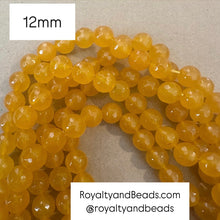 Load image into Gallery viewer, Faceted yellow beads 12mm