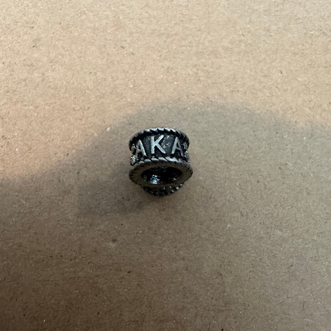 Silver AKA ring charm