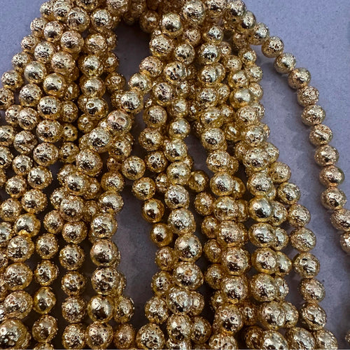 Gold rock beads. 8mm