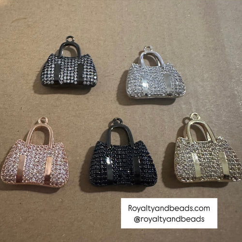 Pave purse charms.