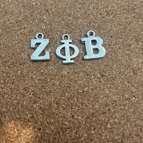 3 Zeta letter charms.