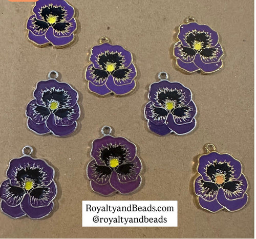 Purple flower charm.