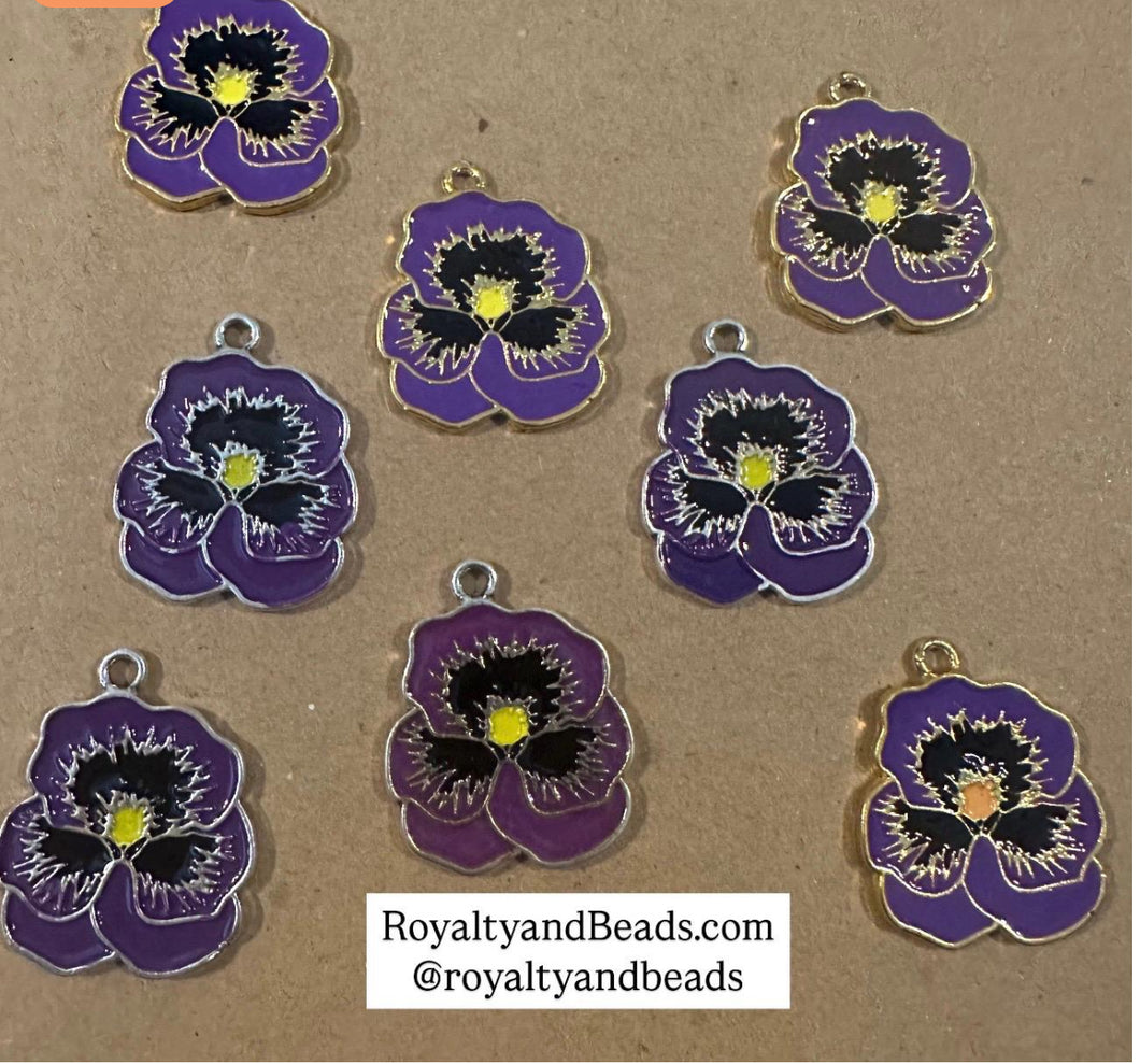Purple flower charm.