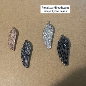 Pave angel wing charm.