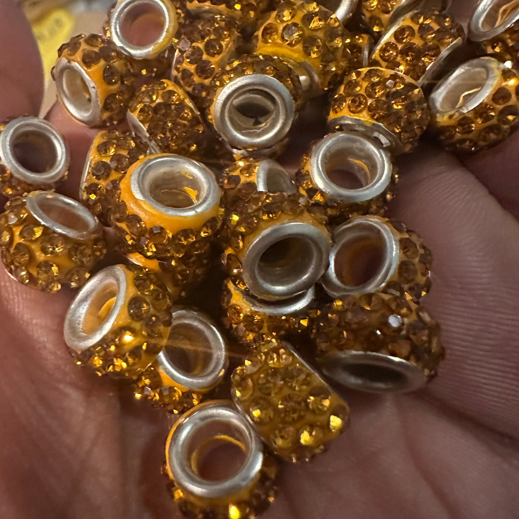 Golden big hole beads.