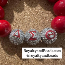 Load image into Gallery viewer, Pave Delta beads.