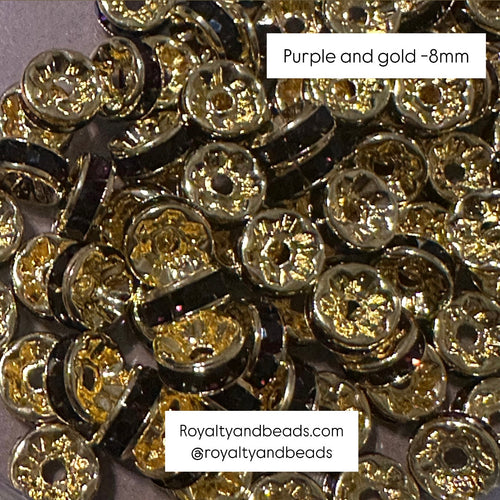50 purple and gold rondelle spacers.